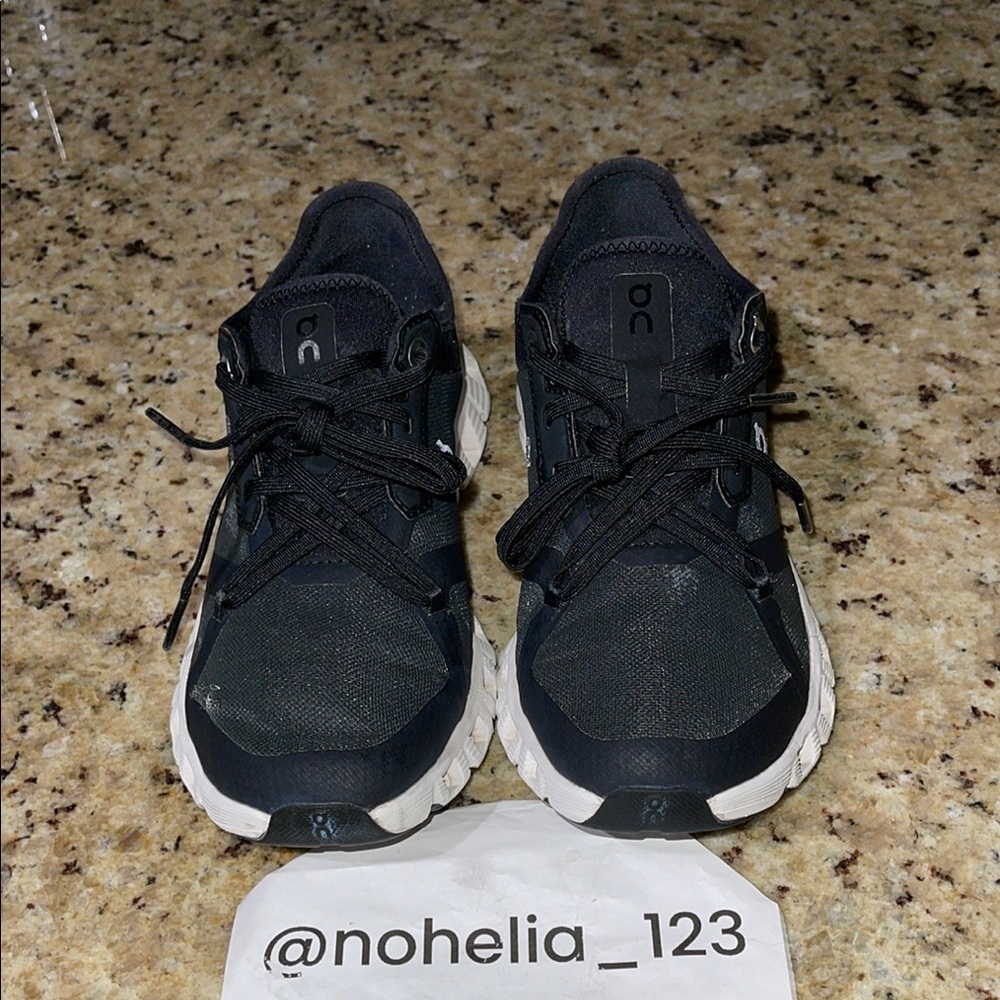 On Running Black and White Athletic Shoes